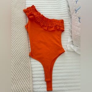 Orange Ruffle Bodysuit